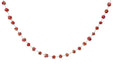 Red and pink glittered wool ball garland with connected spheres draped in a festive swag against a white background.