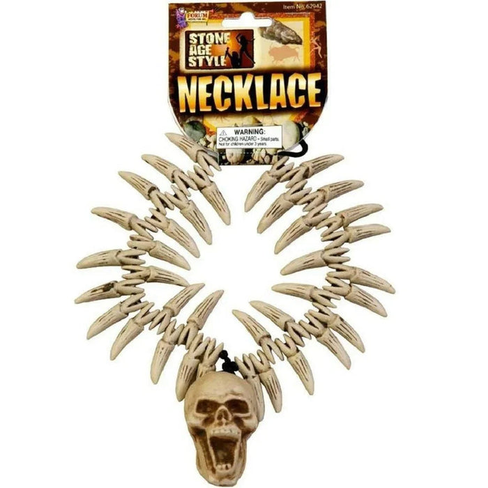 Stone Age Style necklace featuring a cream-colored skull pendant with an open mouth and a circular arrangement of pointed tooth-shaped beads attached above it.