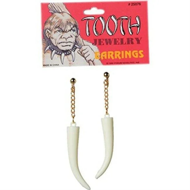 Pair of cream-colored faux tooth earrings with gold chain attachments, displayed with red "Tooth Jewelry Earrings" packaging featuring a cartoon caveman illustration.