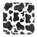 Square white plates with black cow print spots and patches in various sizes throughout the design.
