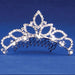 Silver-toned ornate tiara with filigree detailing, rhinestone embellishments, and dangling pearl accents along the comb base, displayed against a blue background.
