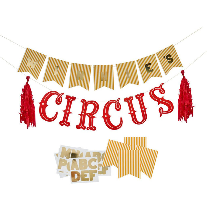 Gold striped banner with "Let's" text at top, large red ornate "CIRCUS" letters in center with red tassels on sides, and gold star-shaped bow decoration below.