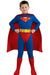 Child wearing a blue and red Superman costume with long sleeves, red cape, yellow belt with circular buckle, and red boots, posing with hands on hips.