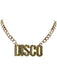 Gold-toned chain necklace with ornate "DISCO" pendant featuring textured surface detail and decorative link chains on both sides.