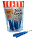 Blue rock candy sticks in a red and white striped paper bag labeled "Old Fashioned Candy Shop Rock Candy on a Stick" with one stick displayed in front.