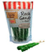 Package of eight green rock candy sticks with red and white striped awning design on the bag, displaying one assembled candy stick beside the packaging.