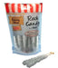 Clear light silver rock candy crystals on wooden sticks displayed next to their red and white striped retail packaging labeled Old Fashioned Candy Shop.