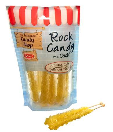 Package of eight yellow rock candy sticks with red and white striped awning design and old-fashioned candy shop label, with one stick displayed in front.