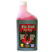 Bottle of fake blood special effects makeup with red and dark liquid separated inside, featuring a printed label with zombie imagery and product information on a white background.
