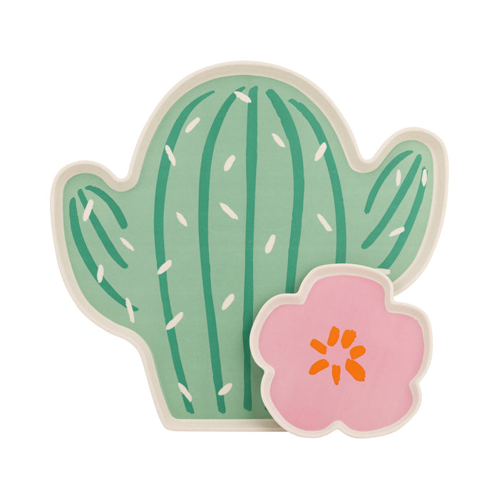 Green cactus-shaped bamboo tray with vertical ribbed details and white spines, paired with a pink flower-shaped tray featuring an orange center.