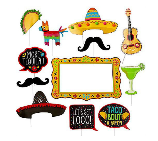 Twelve colorful fiesta-themed photo booth props on sticks including sombreros, mustaches, maracas, guitars, tacos, and a decorative frame with text reading "More Tequila," "Let's Get Loco," and "Taco Bout a Party.