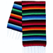 Colorful striped serape blanket with horizontal bands of red, orange, yellow, green, blue, and black, finished with white fringe on both ends.