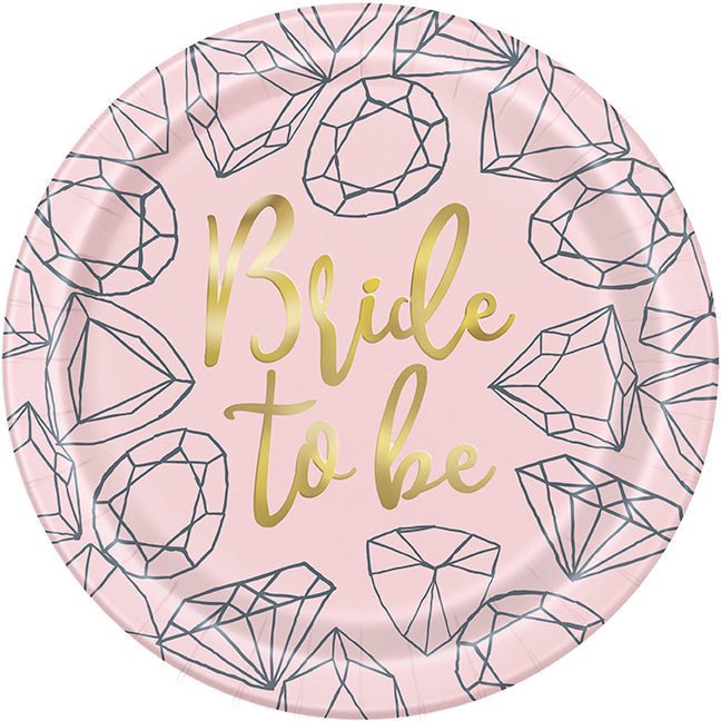 Pink circular plate with gold "Bride to be" text and diamond line drawings throughout.