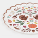 Scalloped cream plate featuring autumn-themed watercolor illustrations including pumpkins, acorns, leaves, and fall flowers in orange, brown, and green tones.