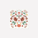 Square napkin featuring a symmetrical folk art design with autumn pumpkins, fall leaves, flowers, and decorative botanical elements in orange, brown, green, and cream tones.