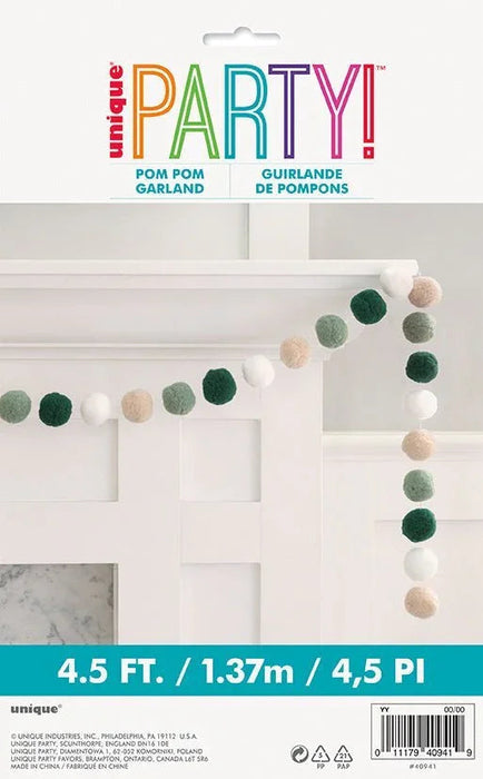 Colorful pom pom garland in white, cream, sage green, and dark green strung together in a 4.5-foot strand displayed draped across white wall paneling.