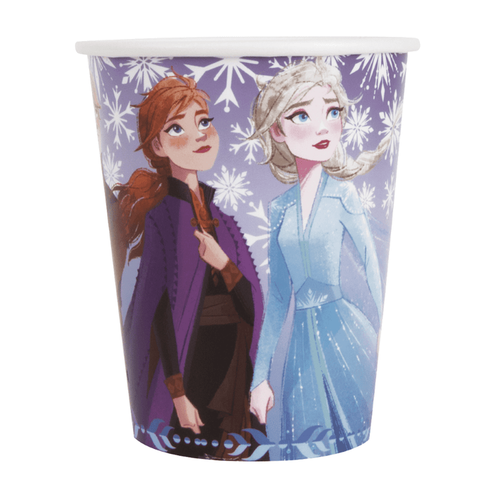Purple paper cup featuring two animated characters with reddish-brown and platinum blonde hair wearing purple and blue outfits against a snowflake patterned background.