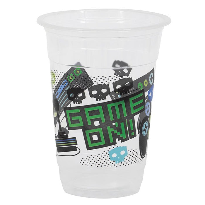 Clear plastic cup printed with "Game On" text in green, black gaming controller graphics, and blue accents on white background.