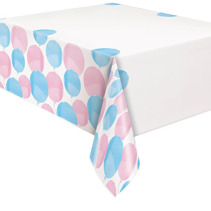 White plastic tablecover with alternating blue and pink oval patterns arranged across the front and sides.