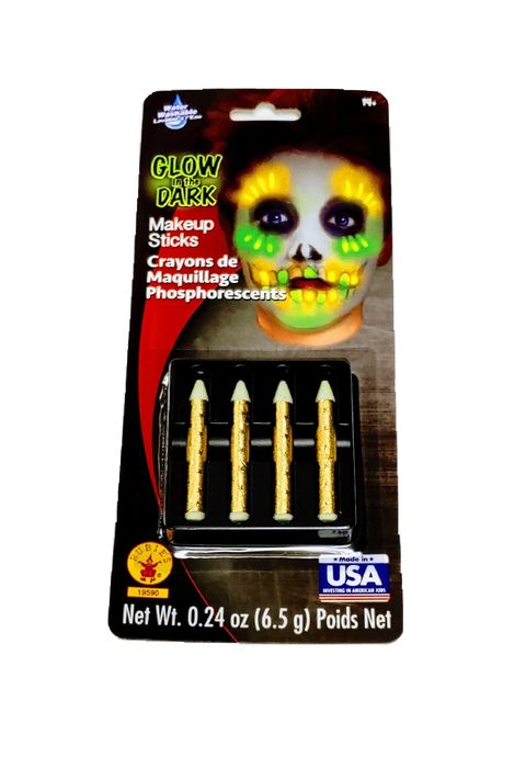Glow in the dark makeup stick set containing four gold and white phosphorescent crayons displayed in black packaging with skull face design example on front.