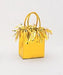 Bright yellow structured handbag with dual handles and decorative gold fringe trim at the top.