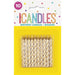 Package of 10 gold spiral twist birthday candles with white striping displayed on a bright yellow background with colorful confetti decorative elements.