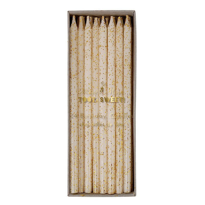 Box of 24 cream-colored tall taper candles with gold glitter speckles throughout, arranged upright in kraft packaging.