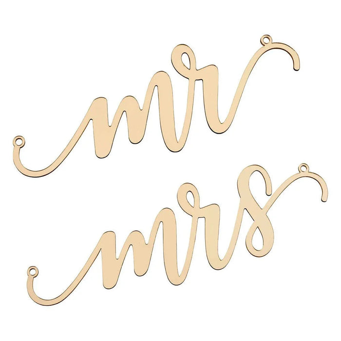 Two wooden chair signs in natural wood finish with wavy decorative edges, one reading "Mr" and one reading "Ox", each with hanging loops.