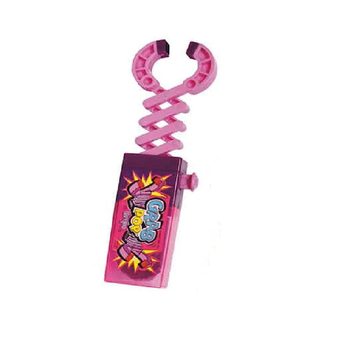 Pink pop-it fidget toy with a twisted handle top and a rectangular base decorated with colorful comic-style graphics and yellow lightning bolt designs.