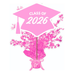 Pink graduation cap centerpiece spray with "Class of 2026" text, featuring a mortarboard on top, metallic star confetti bursting outward, and a pink ribbon bow at the base.