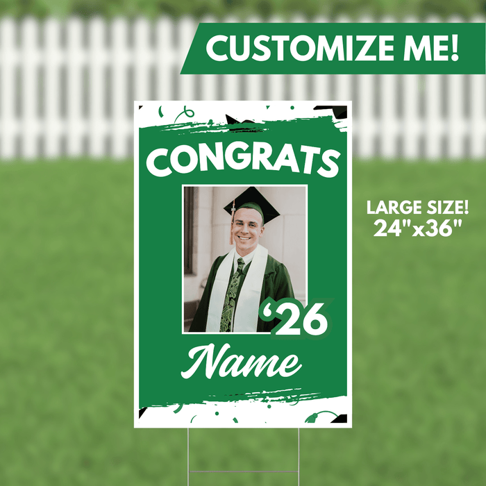 Green yard sign with white text reading "CONGRATS" and "'26" featuring a customizable photo frame and name area, measuring 24 inches by 36 inches.