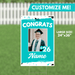 Turquoise yard sign with white text reading "CONGRATS" and "'26" flanking a customizable photo frame, with space for a graduate's name below.