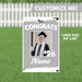 Large silver yard sign measuring 24 by 36 inches with "Congrats" text, a customizable photo frame showing a graduate in cap and gown, the year 2026, and a space for a name at the bottom.