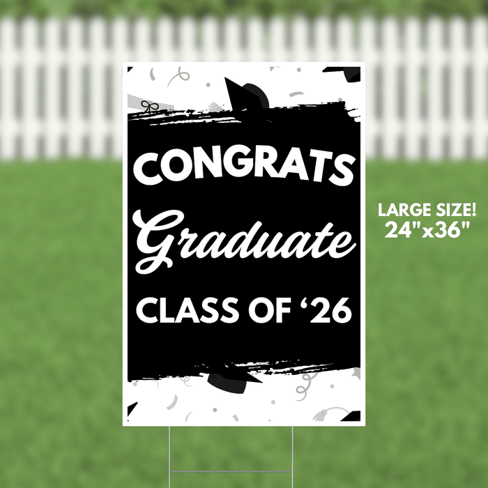 Black and white yard sign reading "CONGRATS Graduate CLASS OF '26" with graduation cap decorations, measuring 24 inches by 36 inches.
