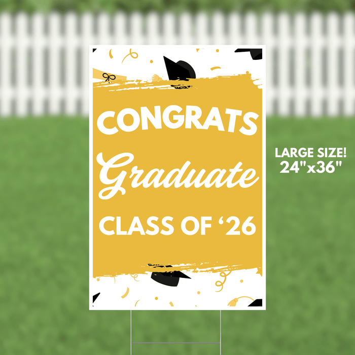Large yellow yard sign with white text reading "Congrats Graduate Class of '26" decorated with black graduation caps and gold confetti designs, measuring 24 by 36 inches.