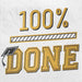 White paper napkin featuring gold and black text reading "100%" with a progress bar, and "DONE" in large gold letters with a graduation cap icon.