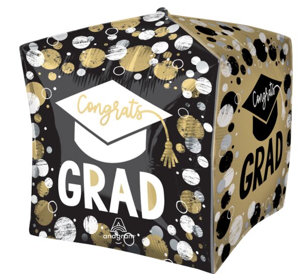 Black and gold cubical mylar balloon decorated with white and gold circles and dots, featuring a white graduation cap and "Congrats GRAD" text in gold lettering.
