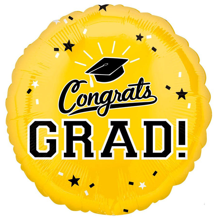 Bright yellow round mylar balloon with "Congrats GRAD!" in black and white text, a graduation cap icon, and scattered black and white stars.