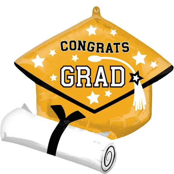 Gold foil balloon shaped like a graduation cap with "CONGRATS GRAD" text and white stars, paired with a white diploma tied with a black ribbon.