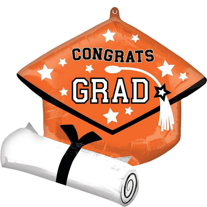 Orange foil balloon shaped like a graduation cap with "CONGRATS GRAD" text, white stars, a tassel, and an accompanying white diploma scroll tied with a black ribbon.