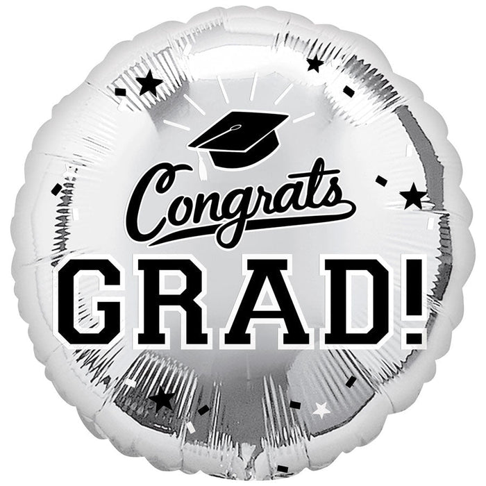 White and silver mylar balloon with black text reading "Congrats GRAD" surrounded by a graduation cap icon and decorative stars and dashes around the scalloped edge.