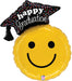 Yellow smiley face mylar balloon with black graduation cap on top and "happy graduation" text, 26 inches.