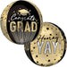 Two gold and black round mylar balloons with "Congrats Grad" and "Hooray Yay" text and star designs displayed side by side.