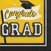 Yellow and black luncheon napkins with "Congrats Grad" text and a mortarboard cap design, pack of 40.