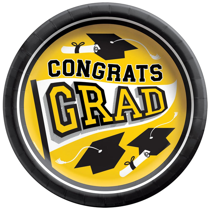 Yellow paper plate with black rim featuring "CONGRATS GRAD" text, graduation caps, and diplomas in black and white accents.