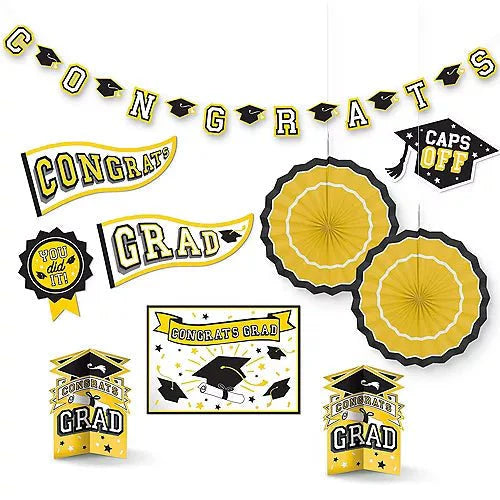 Yellow and black graduation party decoration set with banner, pennants, paper fans, caps, and congratulations signs arranged on white background.