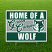 Home of a Green Canyon Wolf yard sign featuring bold green, gray, and white school colors, large white "HOME OF A" and "WOLF" text, a script-style "Green Canyon" across the center, and the Green Canyon Wolves logo on a corrugated plastic yard sign with an H-stake for outdoor display.