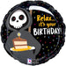 Round black mylar balloon featuring a skeleton character in a hooded robe holding a birthday cake, with "Relax... it's your BIRTHDAY!" text and colorful confetti design on black background.