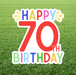 Happy 70th Birthday sign with colorful text on a grass background