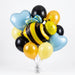 Cheerful balloon bouquet featuring a large yellow and black striped bee with a smiling face, surrounded by light blue heart-shaped foil balloons, yellow and black round latex balloons, and a blue flower-shaped foil balloon.